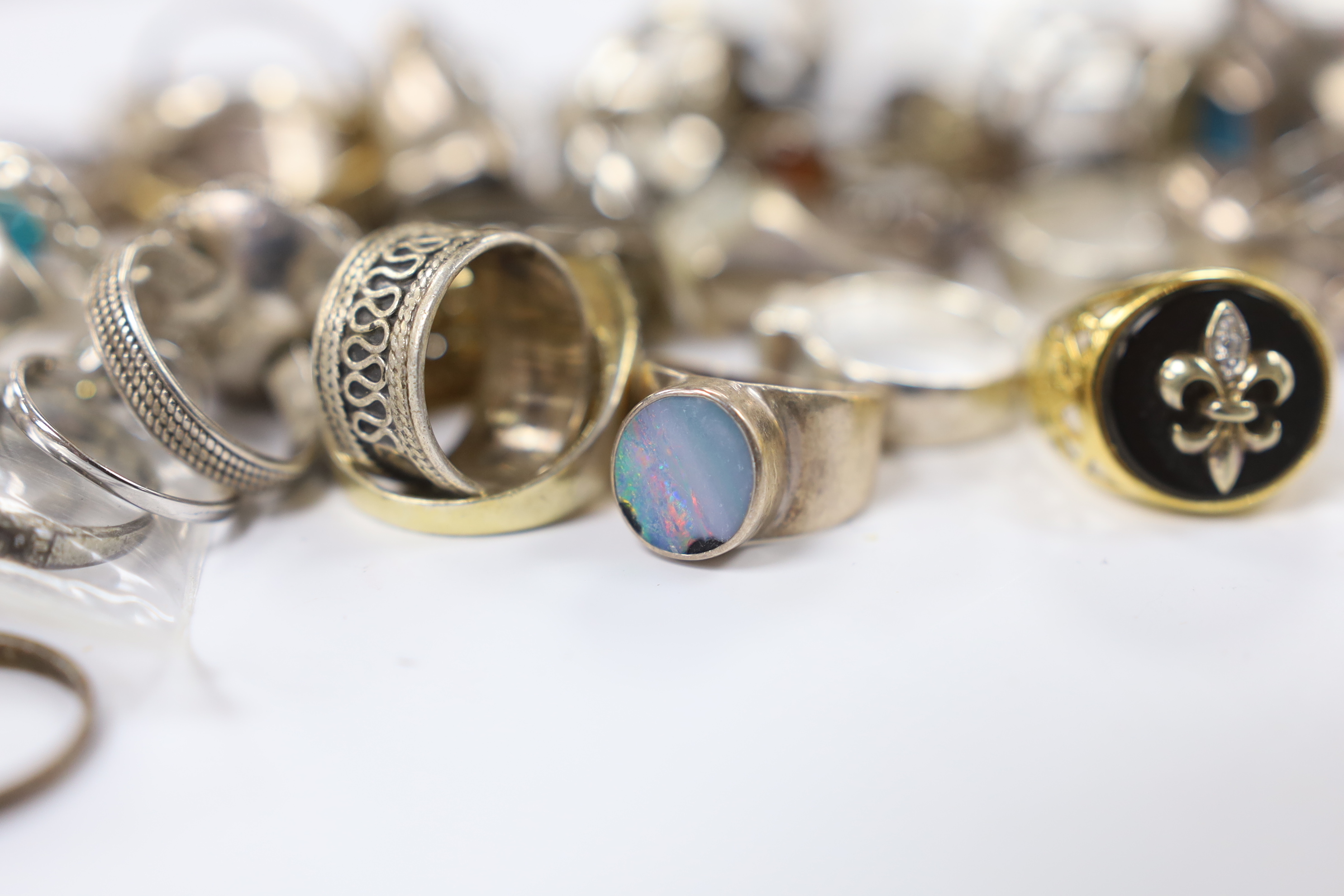 A quantity of assorted mainly white metal and 925 dress rings.